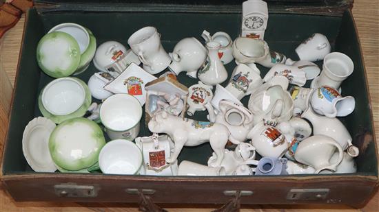 A collection of crested china and two leather suitcases